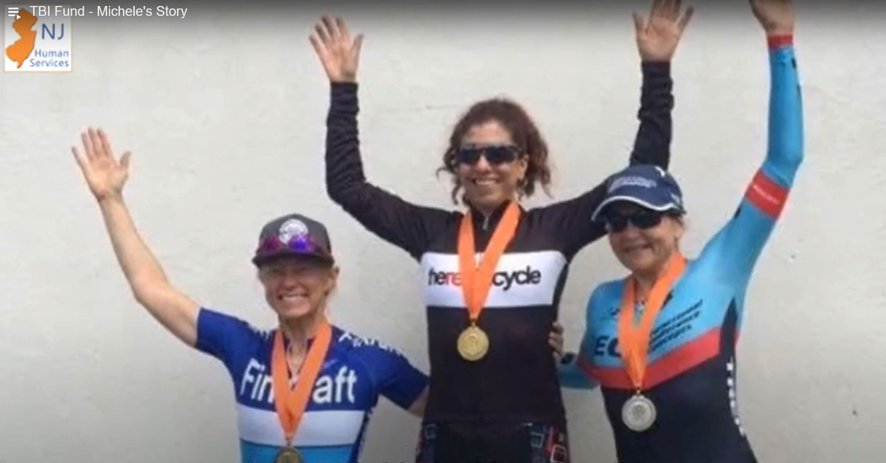 Michelle Bernich with a gold medal with other two medalists.